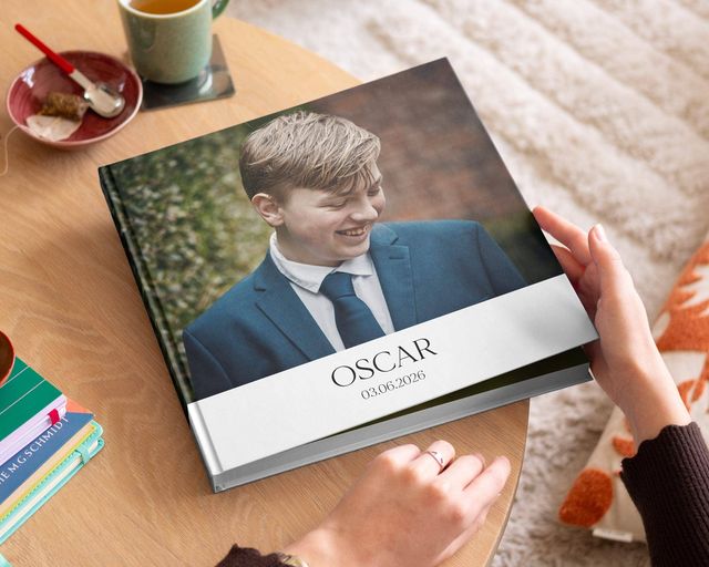 Opened photo book for communion with children imagery