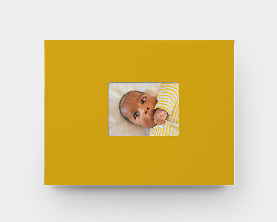 Window cutout photo book with yellow cover