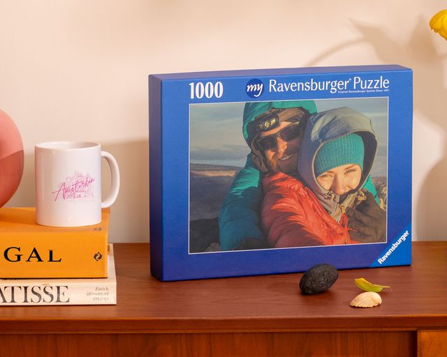 A selection of gifts: framed canvas, jigsaw, photo block and a mug.